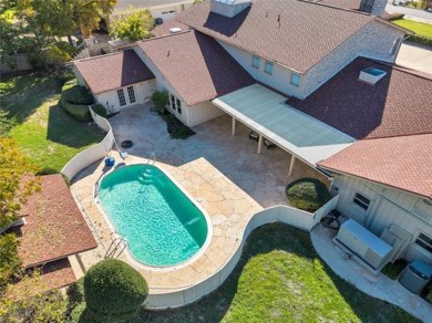 CALLING ALL INVESTORS! This Large 5-bedroom, 7-bath estate with on De Cordova Bend Country Club in Texas - for sale on GolfHomes.com, golf home, golf lot