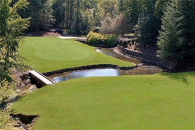 Nestled within the prestigious, gated enclave of Country Club of on Country Club of the South in Georgia - for sale on GolfHomes.com, golf home, golf lot