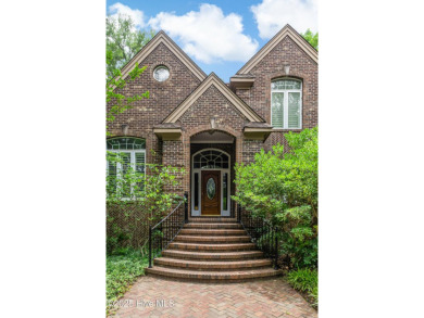 Welcome to this stately brick home overlooking the 11th hole of on Sea Trail Golf Resort in North Carolina - for sale on GolfHomes.com, golf home, golf lot