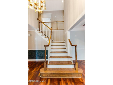 Welcome to this stately brick home overlooking the 11th hole of on Sea Trail Golf Resort in North Carolina - for sale on GolfHomes.com, golf home, golf lot