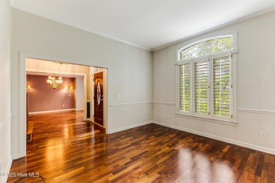 Welcome to this stately brick home overlooking the 11th hole of on Sea Trail Golf Resort in North Carolina - for sale on GolfHomes.com, golf home, golf lot