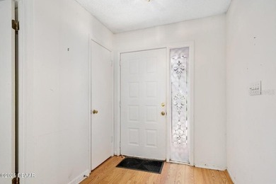 This inviting 3-bedroom, 2-bathroom home with a garage is on The Club At Pelican Bay - North Course in Florida - for sale on GolfHomes.com, golf home, golf lot