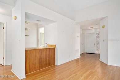 This inviting 3-bedroom, 2-bathroom home with a garage is on The Club At Pelican Bay - North Course in Florida - for sale on GolfHomes.com, golf home, golf lot