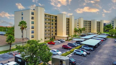 Step into a bright, easy-living 2-bedroom, 2-bath condominium on Cove Cay Country Club in Florida - for sale on GolfHomes.com, golf home, golf lot