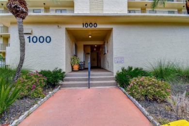 Step into a bright, easy-living 2-bedroom, 2-bath condominium on Cove Cay Country Club in Florida - for sale on GolfHomes.com, golf home, golf lot
