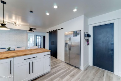 Terrific on-trend fully remodeled single level 2 bdrm/2 bath on Scottsdale Shadows in Arizona - for sale on GolfHomes.com, golf home, golf lot