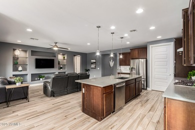 EXPLORE INSPIRED RESORT LIVING IN ARIZONA! Welcome to this on Poston Butte Golf Club in Arizona - for sale on GolfHomes.com, golf home, golf lot