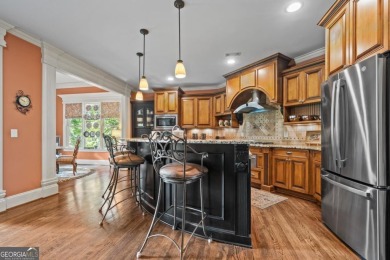 WELCOME TO THIS STUNNING CRAFTSMAN-STYLE HOME LOCATED IN ONE OF on Harbor Club Golf and Country Club in Georgia - for sale on GolfHomes.com, golf home, golf lot