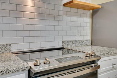 Welcome home to this beautiful four bed, two bath full brick on Augusta National Golf Course and Club in Georgia - for sale on GolfHomes.com, golf home, golf lot