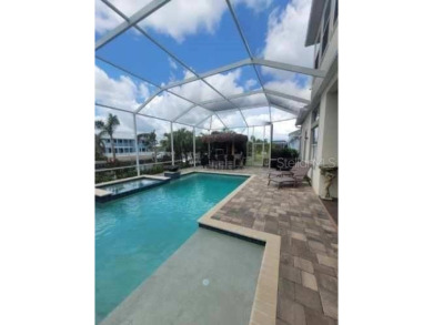 Under contract-accepting backup offers. 998 Signet Blvd | 6 Beds on Apollo Beach Golf and Sea Club in Florida - for sale on GolfHomes.com, golf home, golf lot