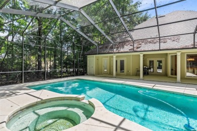Elegant Pool Home in Haile Plantation's Millington - Over  1/2 on Haile Plantation Golf and Country Club in Florida - for sale on GolfHomes.com, golf home, golf lot