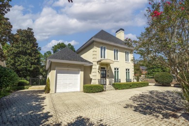 This elegant home with stunning finishes is nestled privately on on Woodside Plantation Country Club in South Carolina - for sale on GolfHomes.com, golf home, golf lot