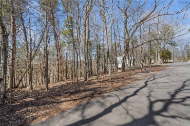 Perched among some of the highest elevations in Lake Arrowhead on The Highlands Course at Lake Arrowhead in Georgia - for sale on GolfHomes.com, golf home, golf lot