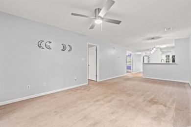 This great first floor unit, with a large screened in back porch on  in South Carolina - for sale on GolfHomes.com, golf home, golf lot