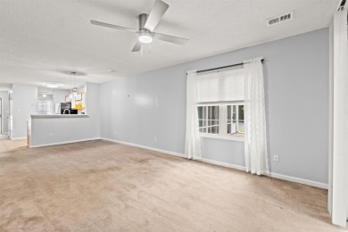 This great first floor unit, with a large screened in back porch on  in South Carolina - for sale on GolfHomes.com, golf home, golf lot
