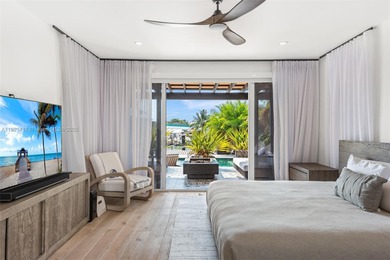 Live in the coveted, gated community of Normandy Shores, known on Normandy Shores Golf Course in Florida - for sale on GolfHomes.com, golf home, golf lot