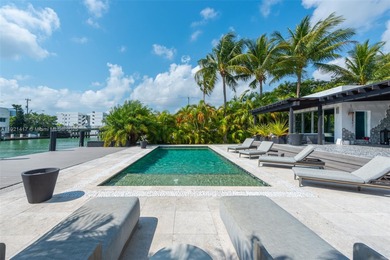 Live in the coveted, gated community of Normandy Shores, known on Normandy Shores Golf Course in Florida - for sale on GolfHomes.com, golf home, golf lot