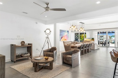 Live in the coveted, gated community of Normandy Shores, known on Normandy Shores Golf Course in Florida - for sale on GolfHomes.com, golf home, golf lot