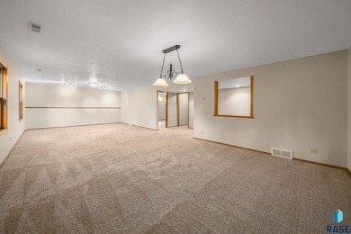 NEW ROOF, CARPET AND PAINT!! Discover the perfect blend of on Prairie Green Golf Course in South Dakota - for sale on GolfHomes.com, golf home, golf lot