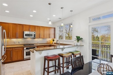 This expansive 2,150 sq ft home built in 2005 offers the perfect on Liberty National in New Jersey - for sale on GolfHomes.com, golf home, golf lot