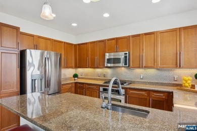 This expansive 2,150 sq ft home built in 2005 offers the perfect on Liberty National in New Jersey - for sale on GolfHomes.com, golf home, golf lot