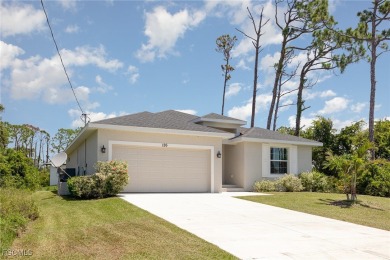 Coastal Charm Meets Modern Comfort in Rotonda Heights! Welcome on Rotonda Golf and Country Club The Palms Course in Florida - for sale on GolfHomes.com, golf home, golf lot