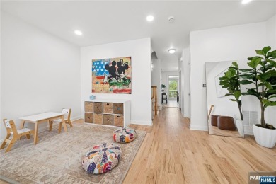 This expansive 2,150 sq ft home built in 2005 offers the perfect on Liberty National in New Jersey - for sale on GolfHomes.com, golf home, golf lot