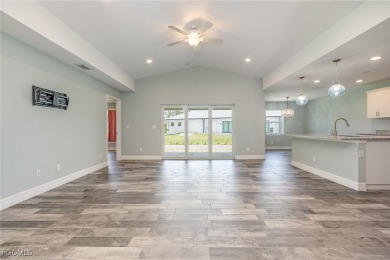 Coastal Charm Meets Modern Comfort in Rotonda Heights! Welcome on Rotonda Golf and Country Club The Palms Course in Florida - for sale on GolfHomes.com, golf home, golf lot
