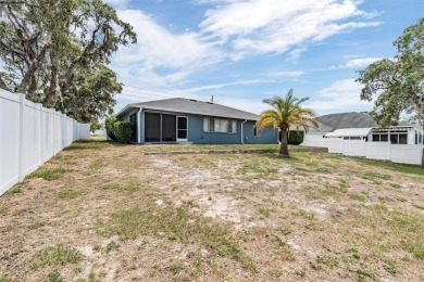 Welcome to 5540 Applegate Dr, Spring Hill, FL 34606--a on Oak Hills Country Club in Florida - for sale on GolfHomes.com, golf home, golf lot