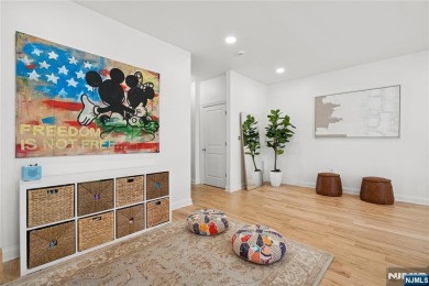 This expansive 2,150 sq ft home built in 2005 offers the perfect on Liberty National in New Jersey - for sale on GolfHomes.com, golf home, golf lot