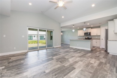 Coastal Charm Meets Modern Comfort in Rotonda Heights! Welcome on Rotonda Golf and Country Club The Palms Course in Florida - for sale on GolfHomes.com, golf home, golf lot