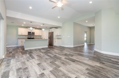 Coastal Charm Meets Modern Comfort in Rotonda Heights! Welcome on Rotonda Golf and Country Club The Palms Course in Florida - for sale on GolfHomes.com, golf home, golf lot