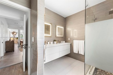 Live in the coveted, gated community of Normandy Shores, known on Normandy Shores Golf Course in Florida - for sale on GolfHomes.com, golf home, golf lot