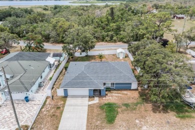 Welcome to 5540 Applegate Dr, Spring Hill, FL 34606--a on Oak Hills Country Club in Florida - for sale on GolfHomes.com, golf home, golf lot
