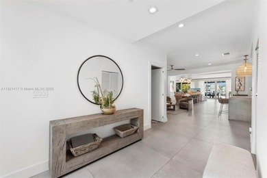 Live in the coveted, gated community of Normandy Shores, known on Normandy Shores Golf Course in Florida - for sale on GolfHomes.com, golf home, golf lot