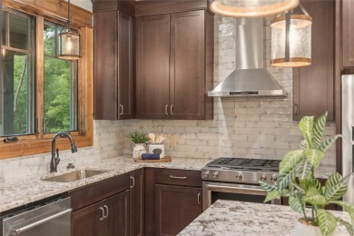 Discover the ultimate mountain living experience with this newly on Natures Walk At Chinquapin in North Carolina - for sale on GolfHomes.com, golf home, golf lot
