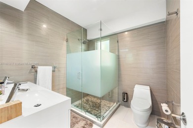 Live in the coveted, gated community of Normandy Shores, known on Normandy Shores Golf Course in Florida - for sale on GolfHomes.com, golf home, golf lot