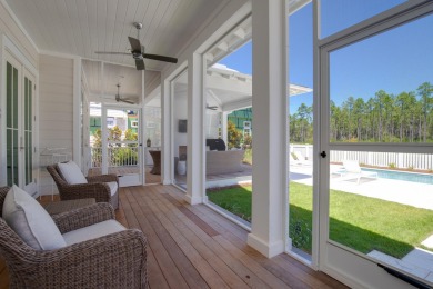 This stunning new home built by Dune Construction features the on Origins Golf Club in Florida - for sale on GolfHomes.com, golf home, golf lot