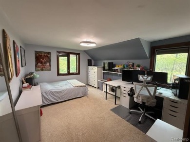 Welcome to this charming English Tudor home, nestled in tranquil on River Bank Golf Course in Michigan - for sale on GolfHomes.com, golf home, golf lot