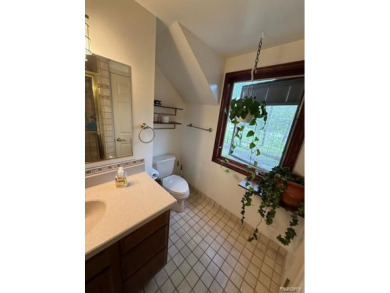 Welcome to this charming English Tudor home, nestled in tranquil on River Bank Golf Course in Michigan - for sale on GolfHomes.com, golf home, golf lot