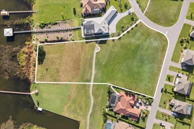 A RARE LUXURY LAKEFRONT OPPORTUNITY Welcome to a lifestyle on Deer Island Country Club in Florida - for sale on GolfHomes.com, golf home, golf lot
