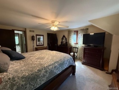 Welcome to this charming English Tudor home, nestled in tranquil on River Bank Golf Course in Michigan - for sale on GolfHomes.com, golf home, golf lot