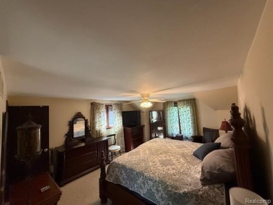 Welcome to this charming English Tudor home, nestled in tranquil on River Bank Golf Course in Michigan - for sale on GolfHomes.com, golf home, golf lot