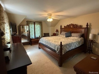 Welcome to this charming English Tudor home, nestled in tranquil on River Bank Golf Course in Michigan - for sale on GolfHomes.com, golf home, golf lot