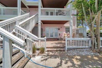 Once you pull through the gate you will not want to leave this on St. Petersburg Country Club in Florida - for sale on GolfHomes.com, golf home, golf lot