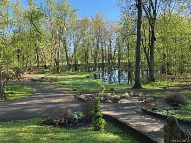 Welcome to this charming English Tudor home, nestled in tranquil on River Bank Golf Course in Michigan - for sale on GolfHomes.com, golf home, golf lot