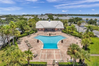 Once you pull through the gate you will not want to leave this on St. Petersburg Country Club in Florida - for sale on GolfHomes.com, golf home, golf lot