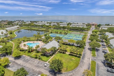 Once you pull through the gate you will not want to leave this on St. Petersburg Country Club in Florida - for sale on GolfHomes.com, golf home, golf lot