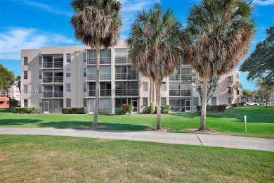 Beautiful 3/2 condo with serene lake and golf course views in on Pine Island Ridge Country Club in Florida - for sale on GolfHomes.com, golf home, golf lot