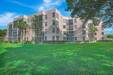 Beautiful 3/2 condo with serene lake and golf course views in on Pine Island Ridge Country Club in Florida - for sale on GolfHomes.com, golf home, golf lot